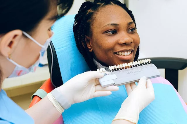 girl getting a teeth bleaching treatment 