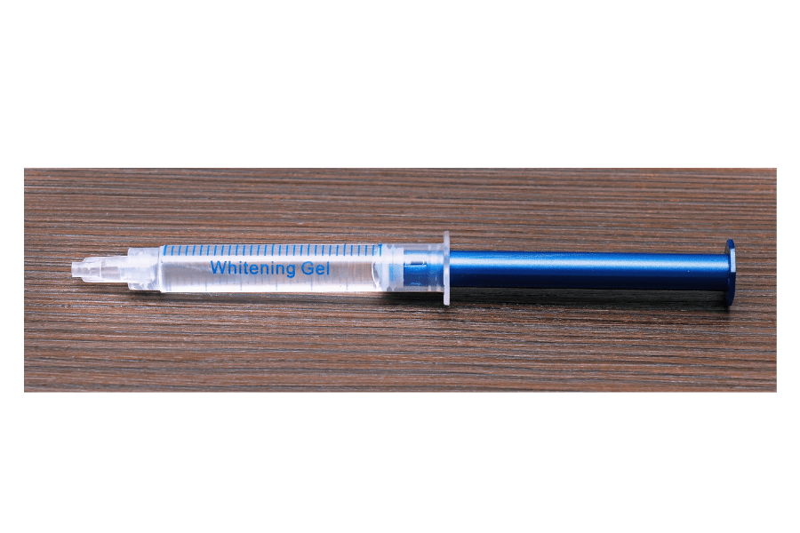 syringe-with-teeth-whitening-gel